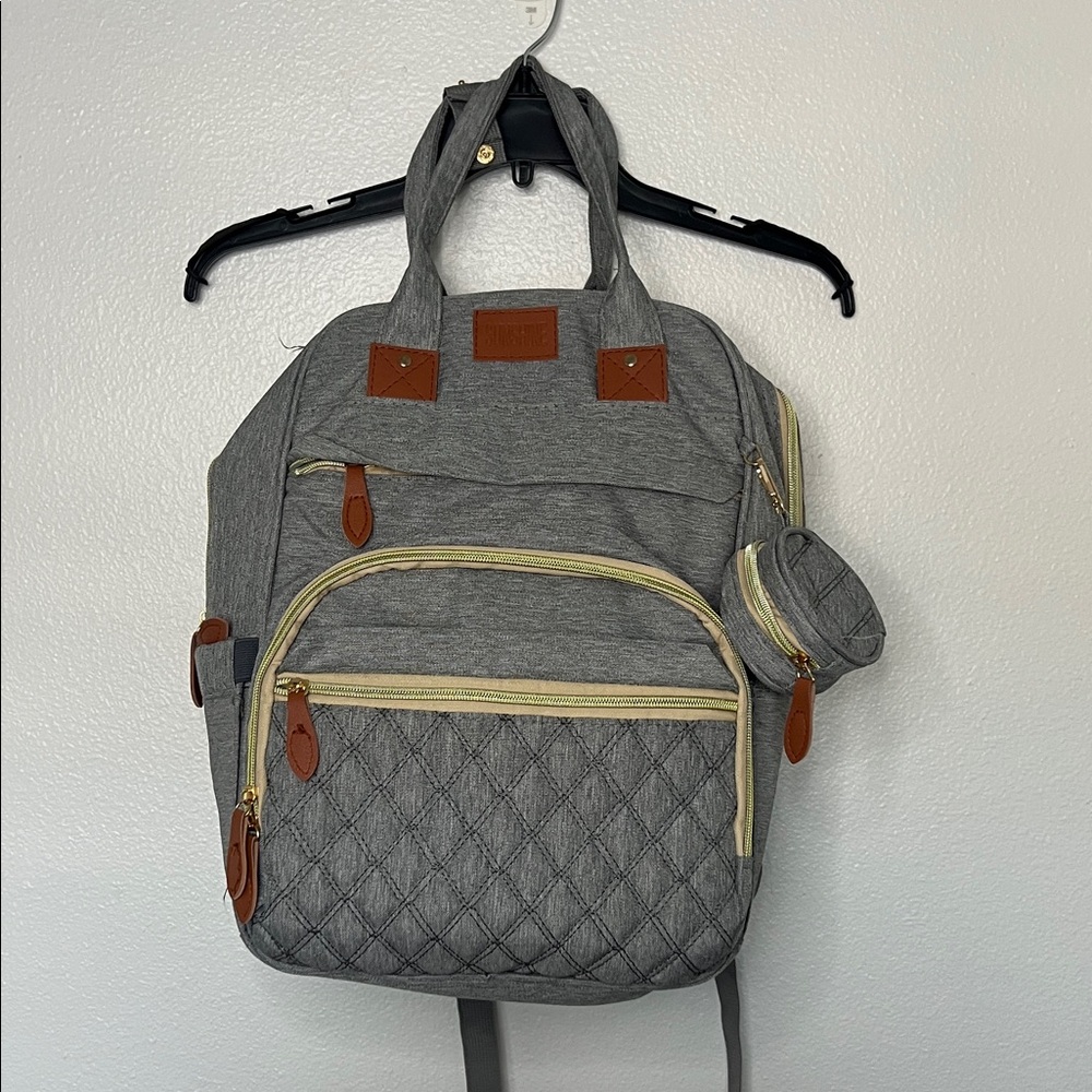 Gray Quilted Backpack with Brown Accents